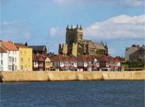 A scenic view of the Headland as seen from the sea