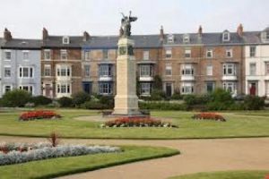 A photograph of the famous war memorial overlooking the Headland